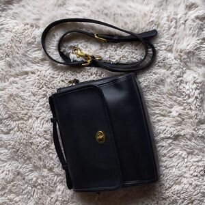 Elegant Black Satchel with Gold Accents